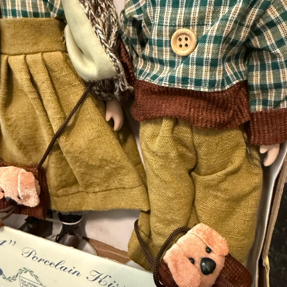 Charming Ceramic Doll Set with Green and Brown Outfits - Picture 4 of 6